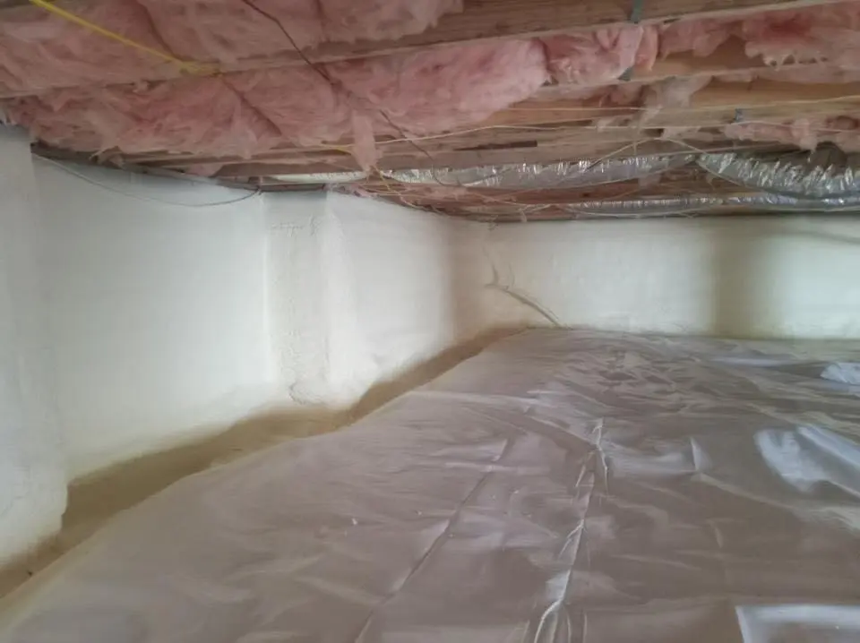 Crawl space encapsulation with closed-cell spray foam for Commercial Roof Restoration in Derry